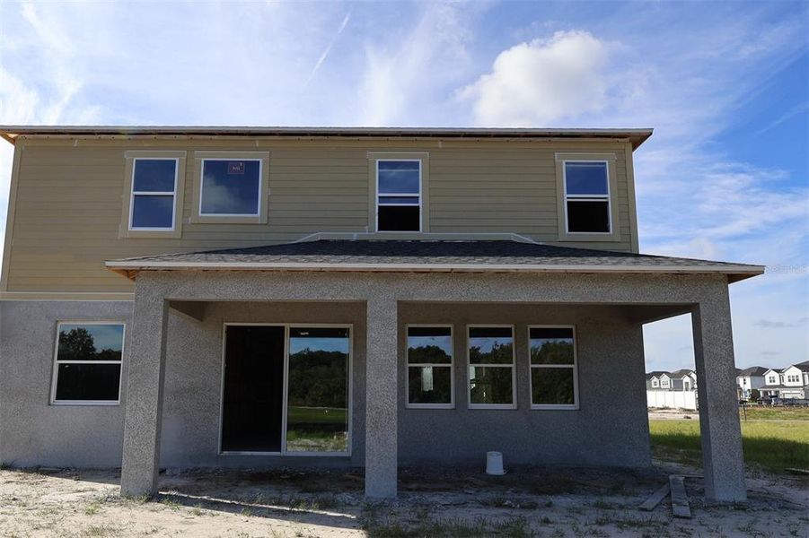 Exterior details and patio area of a home in Estates at Rivercrest, Sanford (Image 3). Exterior details and patio area of a home in Estates at Rivercrest, Sanford (Image 3).