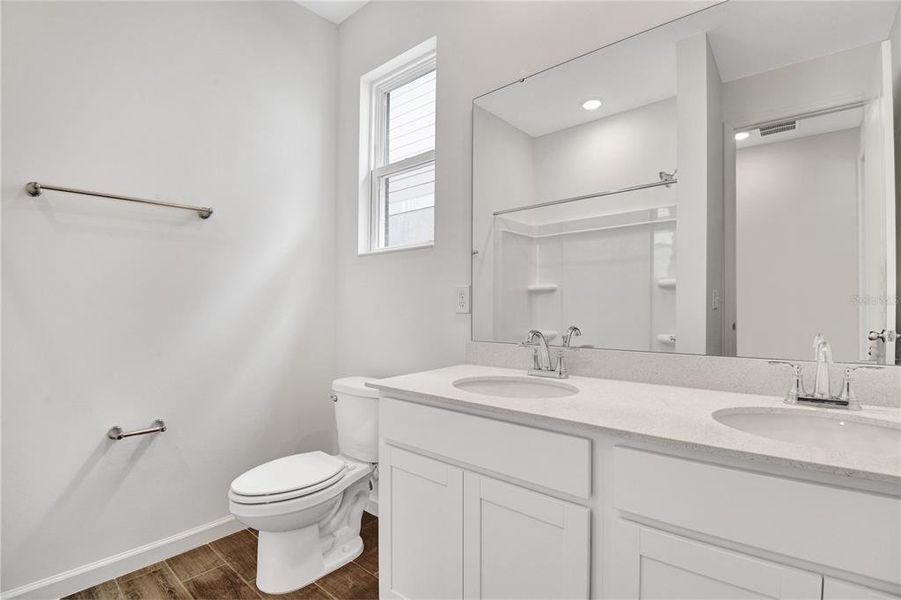 Furnished interior view inside a new home in Seasons at Shores of Lake Dell, Dundee (Image 4).