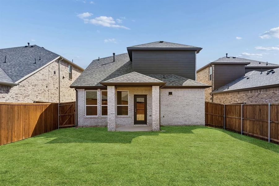 Exterior details and patio area of a home in AnaCapri, Anna (Image 17).