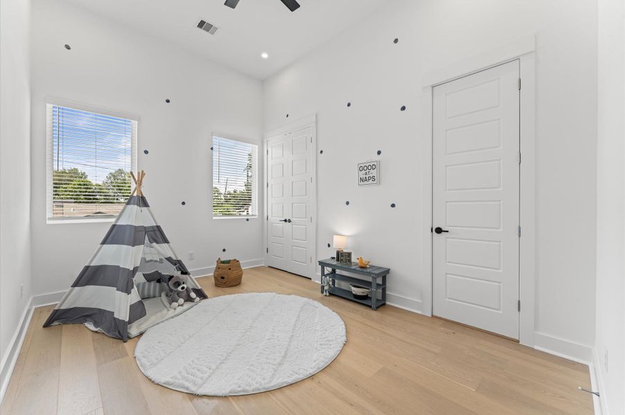 This well-sized and conveniently located third-floor bedroom features a spacious closet and an ensuite bathroom.