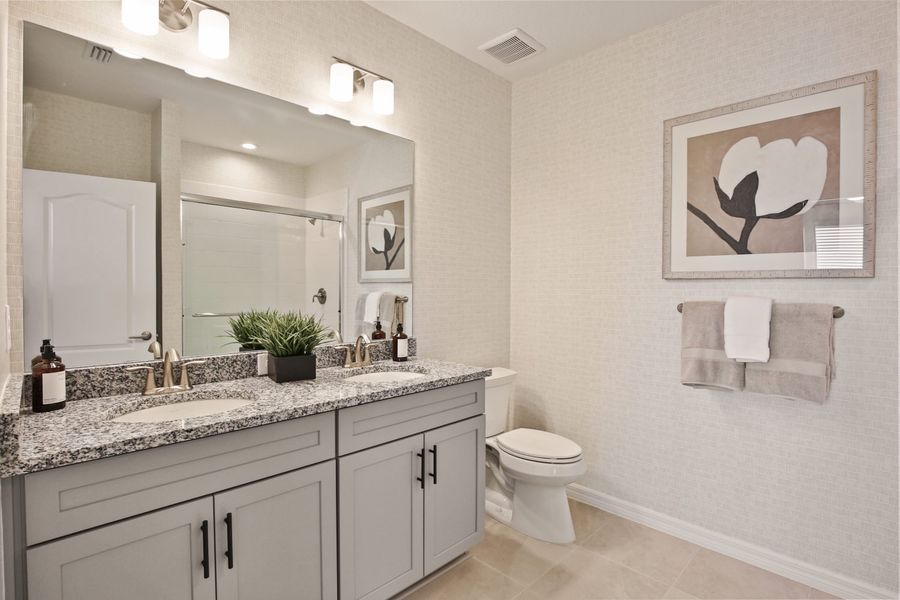 Representative furnished interior of a home built from the Morgan by Neal Communities in SkySail, Naples (Image 12).