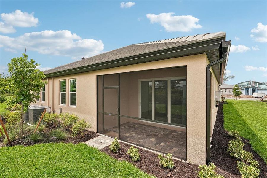 Exterior details and patio area of a home in Sweetwater at Lakewood Ranch, Lakewood Ranch (Image 11).
