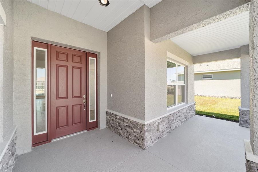 Exterior details and patio area of a home in On Top of the World Communities, Ocala (Image 23).