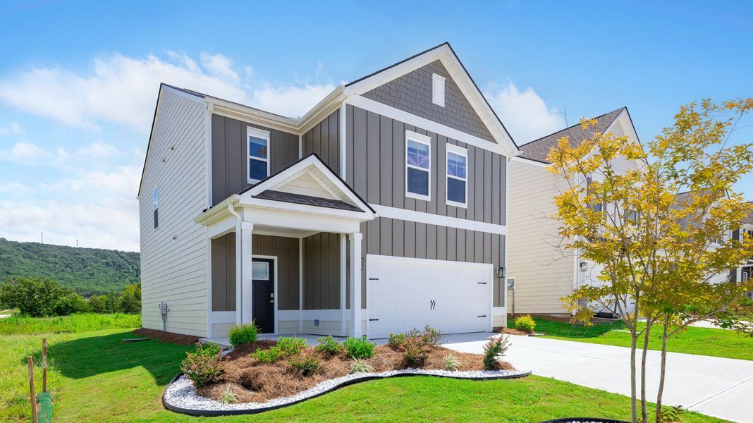 Front exterior of a new home in Harbor Crest, Ooltewah, TN, highlighting curb appeal (Image 2). Front exterior of a new home in Harbor Crest, Ooltewah, TN, highlighting curb appeal (Image 2).