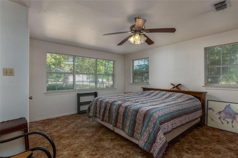 Bedroom with lots of natural lighting