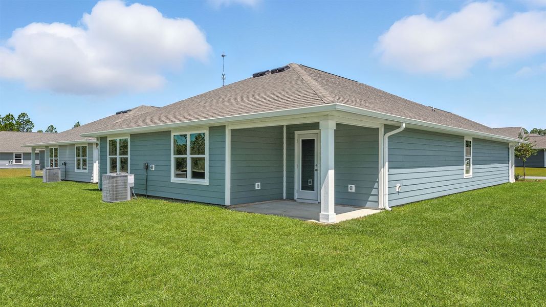 Front exterior of a new home in Palmetto Bluff, Port Saint Joe, FL, highlighting curb appeal (Image 18). Front exterior of a new home in Palmetto Bluff, Port Saint Joe, FL, highlighting curb appeal (Image 18).