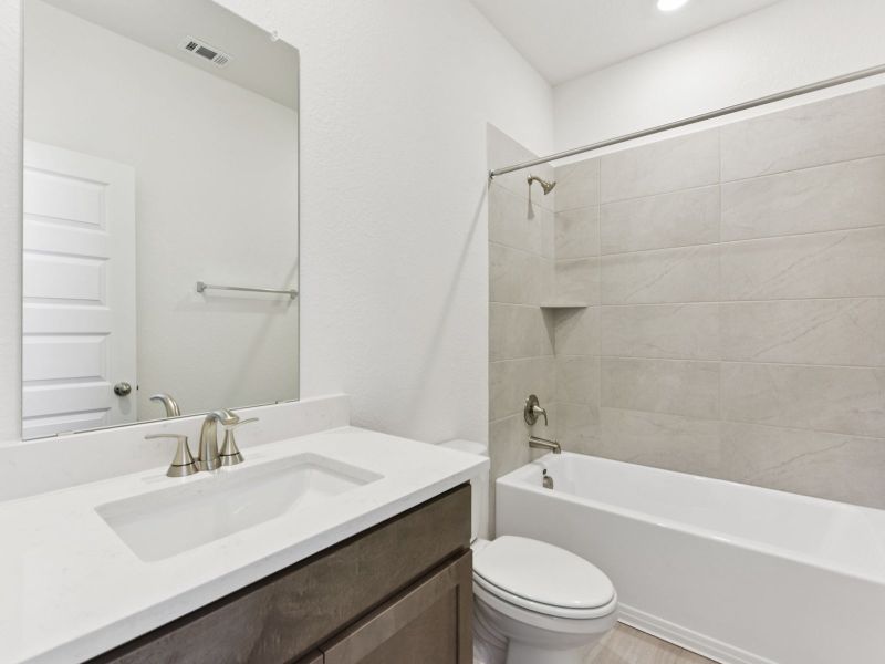 Furnished interior view inside a new home in Prairie Winds - Executive Collection, Hutto (Image 6).