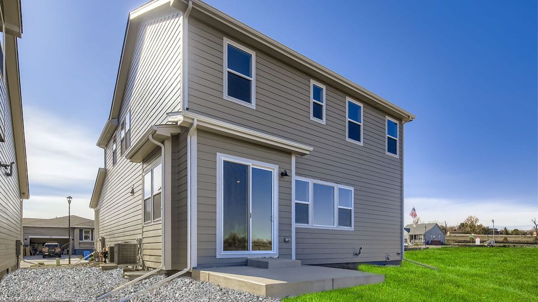 Exterior details and patio area of a home in Country Club Reserve – Fort Collins, Fort Collins (Image 3).