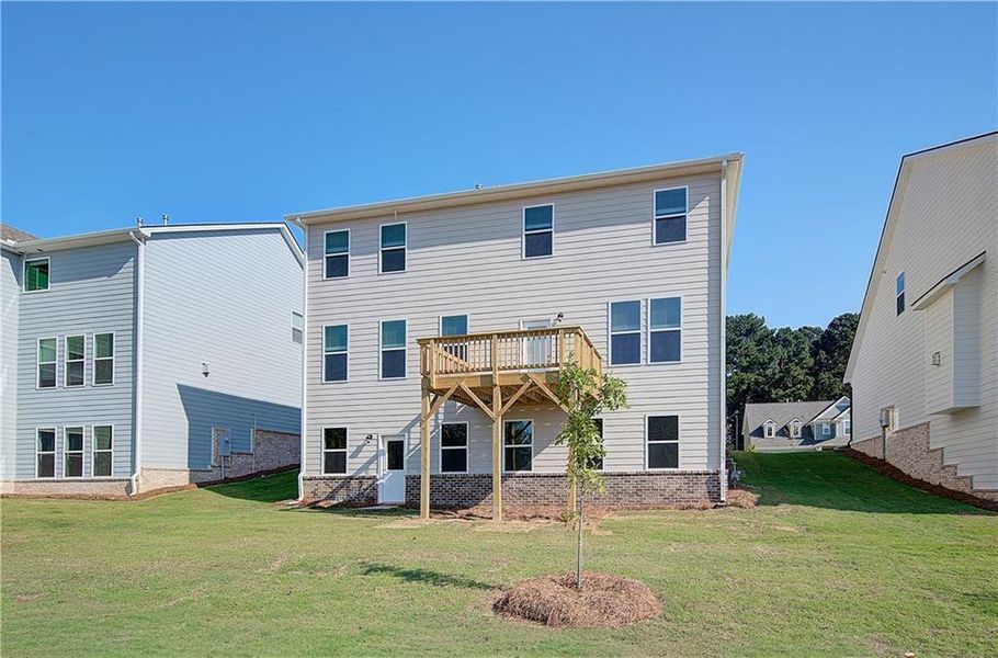 Front exterior of a new home in Cooper Park, McDonough, GA, highlighting curb appeal (Image 16).