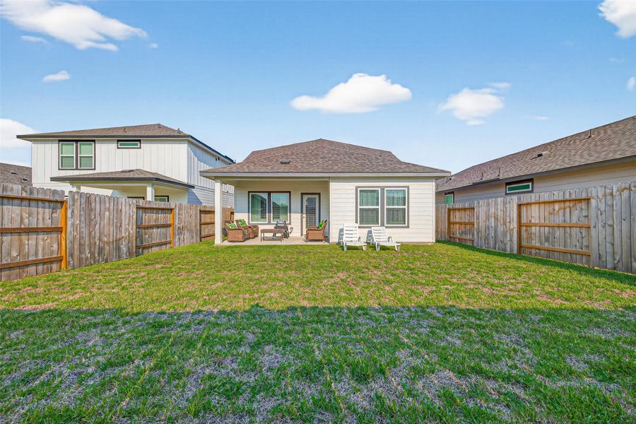 Exterior details and patio area of a home in Mavera, Conroe (Image 24). Exterior details and patio area of a home in Mavera, Conroe (Image 24).
