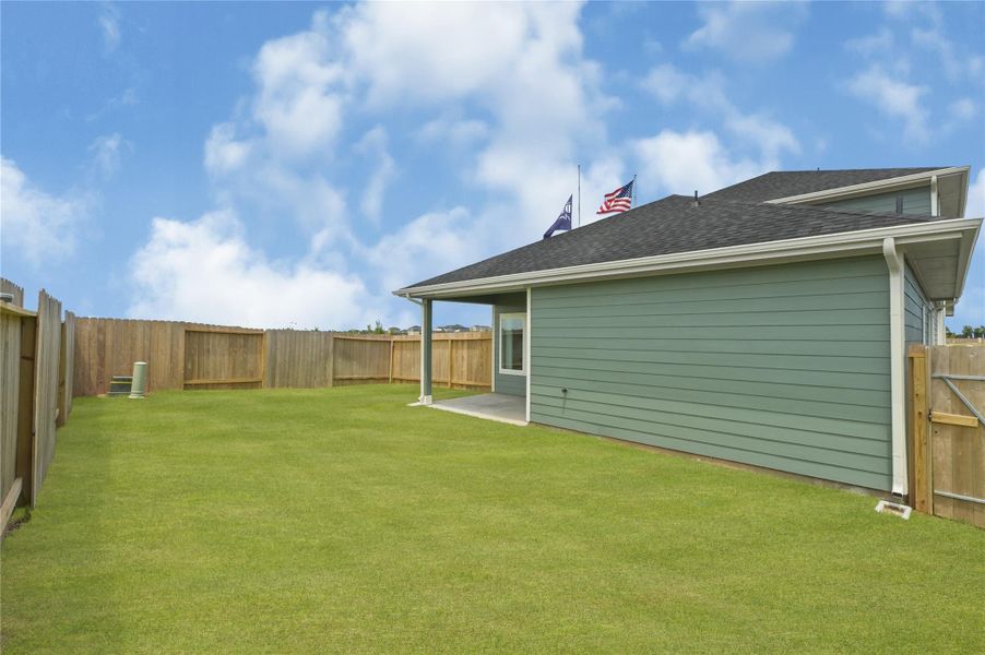 Exterior details and patio area of a home in Holly Ridge, Rosenberg (Image 24).