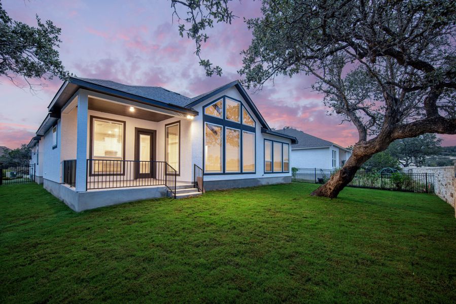 Representative exterior photo of a completed home built from the Mackenzie by Chesmar Homes in Sienna Lakes, San Antonio, TX (Image 19).