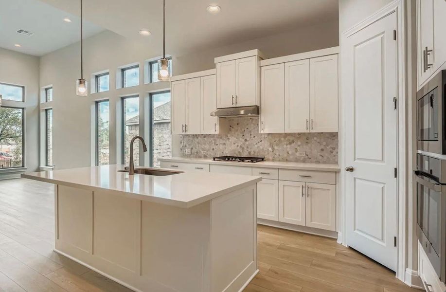 Furnished interior view inside a new home in 6 Creeks, Kyle (Image 6).