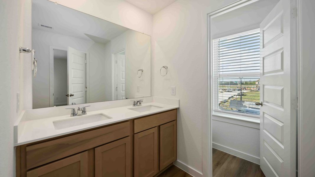 Furnished interior view inside a new home in Grand West, Houston (Image 4).