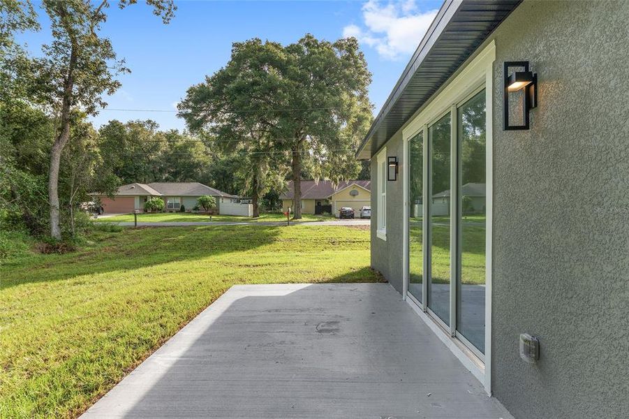 Exterior details and patio area of a home in , Ocala (Image 29).