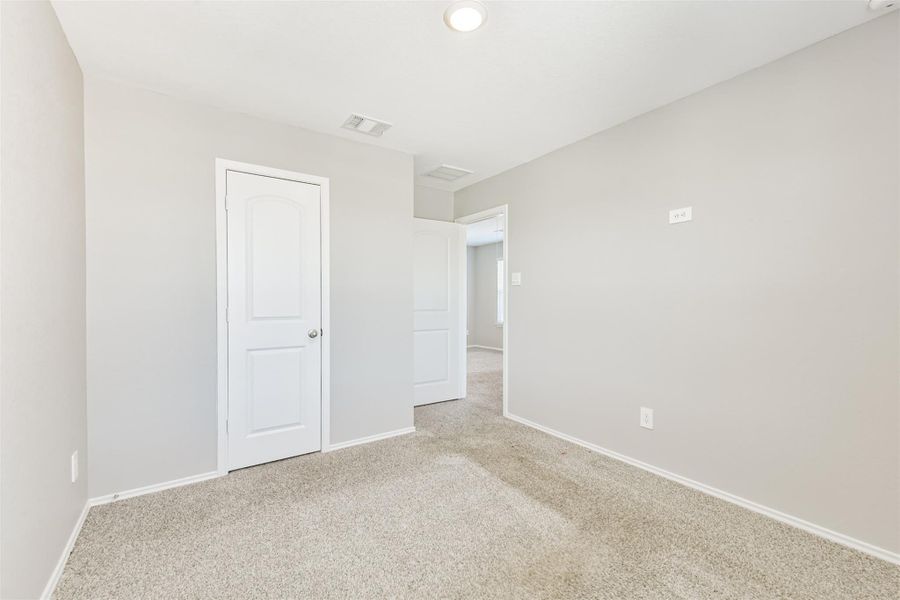 Spacious, unfurnished interior of a new home in Harrington Trails at The Canopies, New Caney (Image 19).
