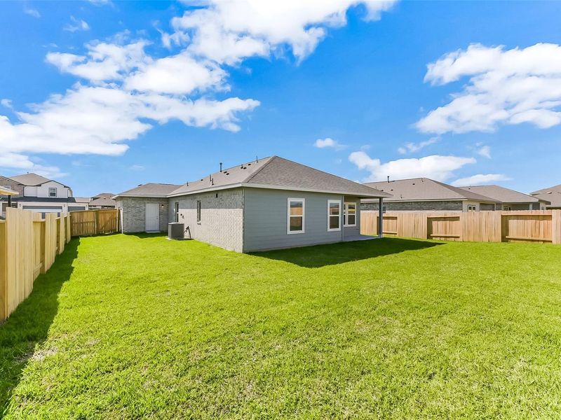 Exterior details and patio area of a home in River Ranch Meadows, Dayton (Image 33).