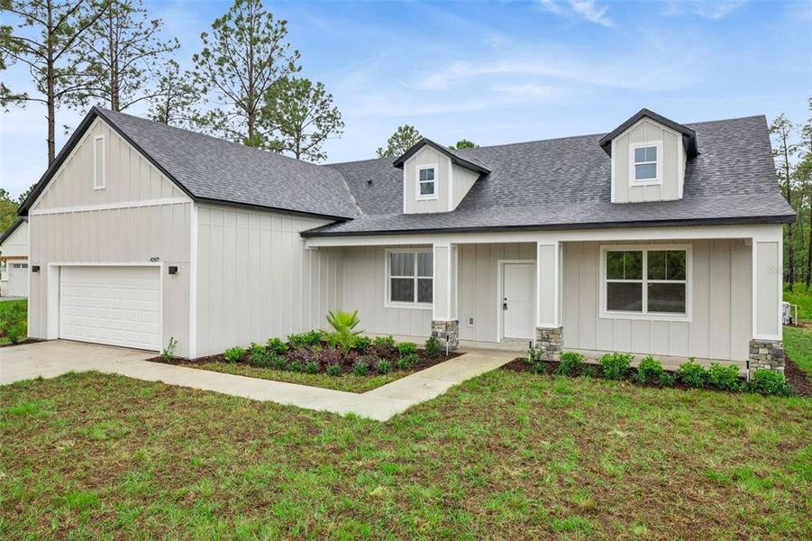 Front exterior of a new home in , Eustis, FL, highlighting curb appeal (Image 1). Front exterior of a new home in , Eustis, FL, highlighting curb appeal (Image 1).