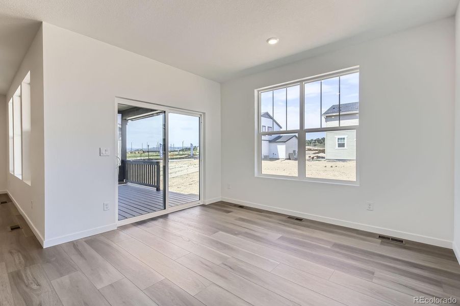 Spacious, unfurnished interior of a new home in Riano Ridge: The Monarch Collection, Loveland (Image 7).