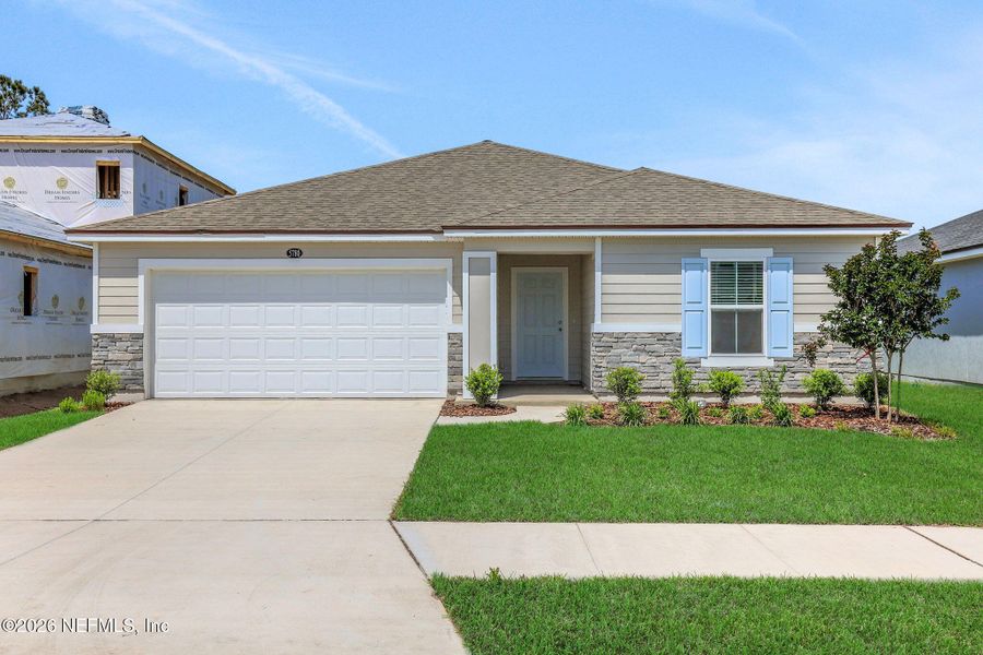 Front exterior of a new home in Diamond Springs, Jacksonville, FL, highlighting curb appeal (Image 21).