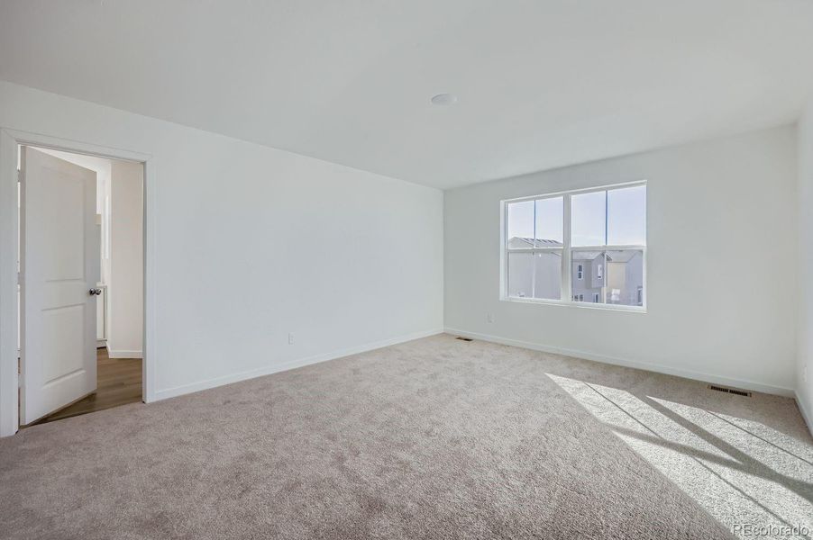 Spacious, unfurnished interior of a new home in Copper Chase: The Celestial Collection, Colorado Springs (Image 12).