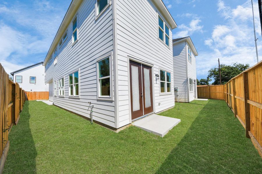 Exterior details and patio area of a home in , Houston (Image 4). Exterior details and patio area of a home in , Houston (Image 4).