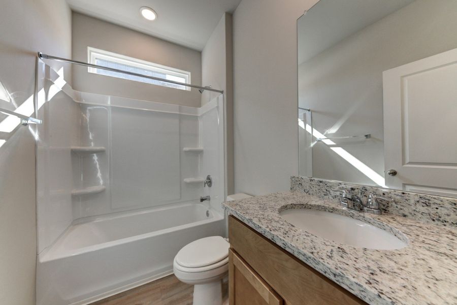 Furnished interior view inside a new home in The Woodlands, Mico (Image 8).