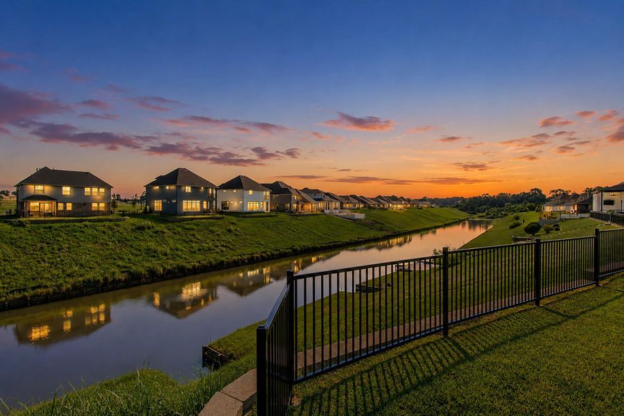 Peaceful sunset view of the waterway directly behind the property