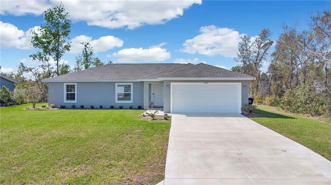Front exterior of a new home in , Ocala, FL, highlighting curb appeal (Image 20).