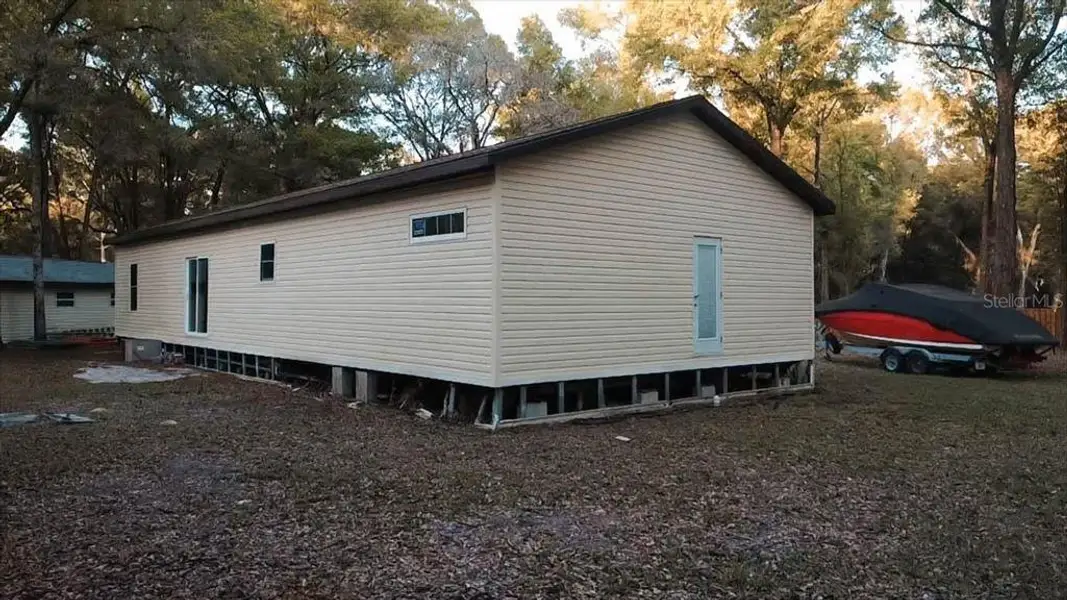 Exterior details and patio area of a home in , Spring Hill (Image 3).