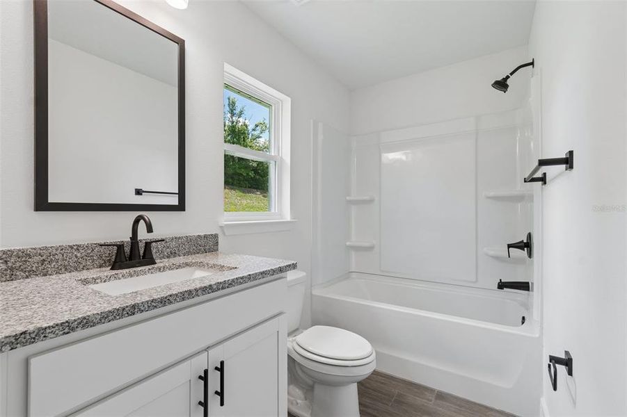 Furnished interior view inside a new home in Abbey Glen, Dade City (Image 9).