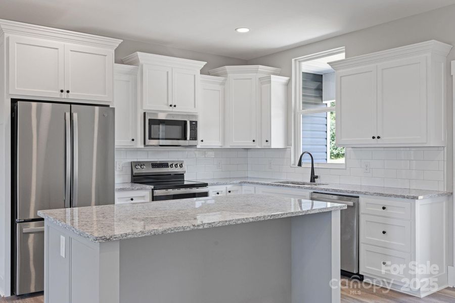 Furnished interior view inside a new home in , Vale (Image 4). Furnished interior view inside a new home in , Vale (Image 4).