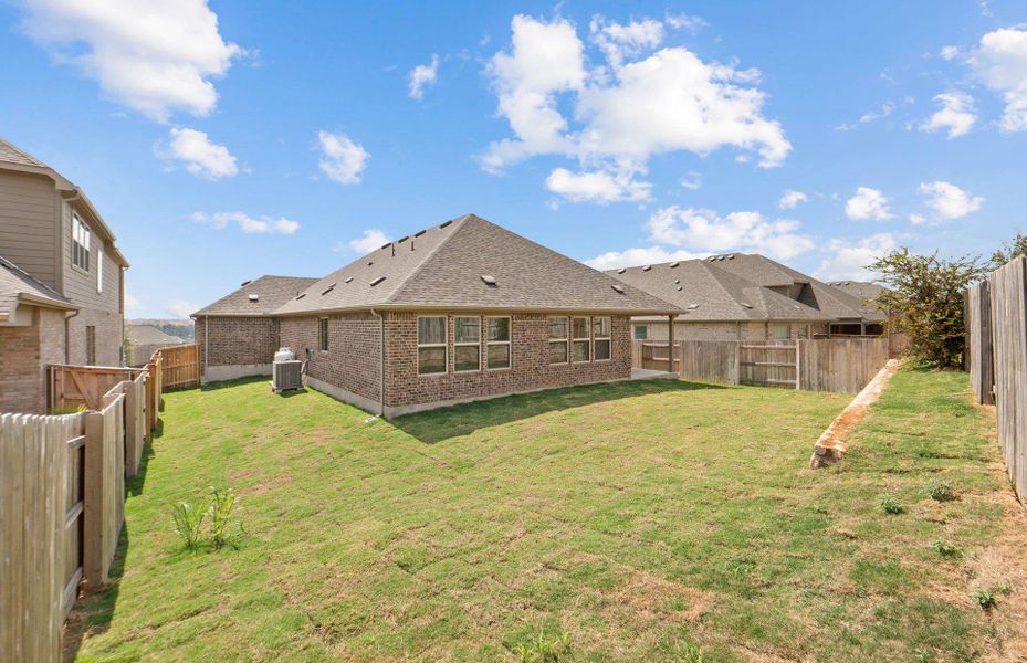Exterior details and patio area of a home in Crescent Bluff, Georgetown (Image 17).
