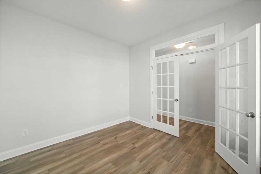 Spacious, unfurnished interior of a new home in Cottages at Piper Village, Trinity (Image 18).