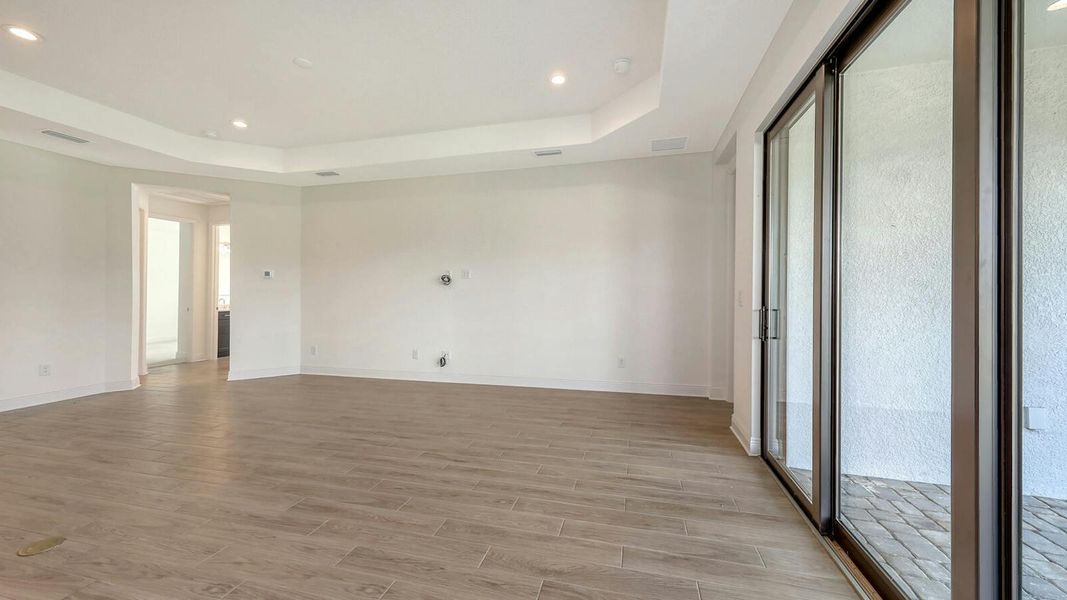 Spacious, unfurnished interior of a new home in Palm Grove Real Estate and Homes for Sale in Lakewood Ranch, FL - Neal Communities, Lakewood Ranch (Image 46).