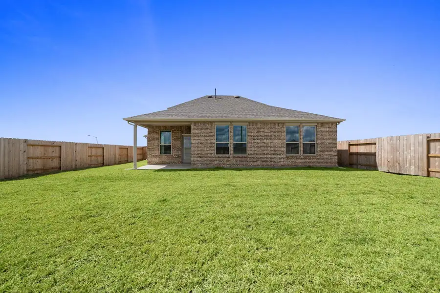 Exterior details and patio area of a home in River Ranch, Dayton (Image 2). Exterior details and patio area of a home in River Ranch, Dayton (Image 2).