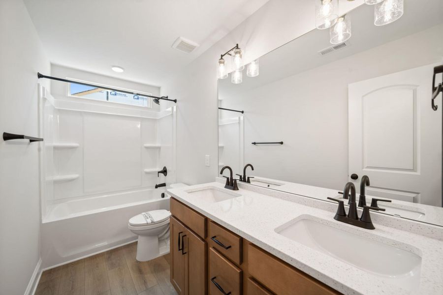Furnished interior view inside a new home in Hayes Village, Greensboro (Image 10).