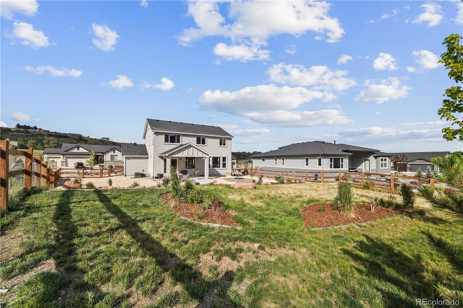 Front exterior of a new home in , Monument, CO, highlighting curb appeal (Image 22).