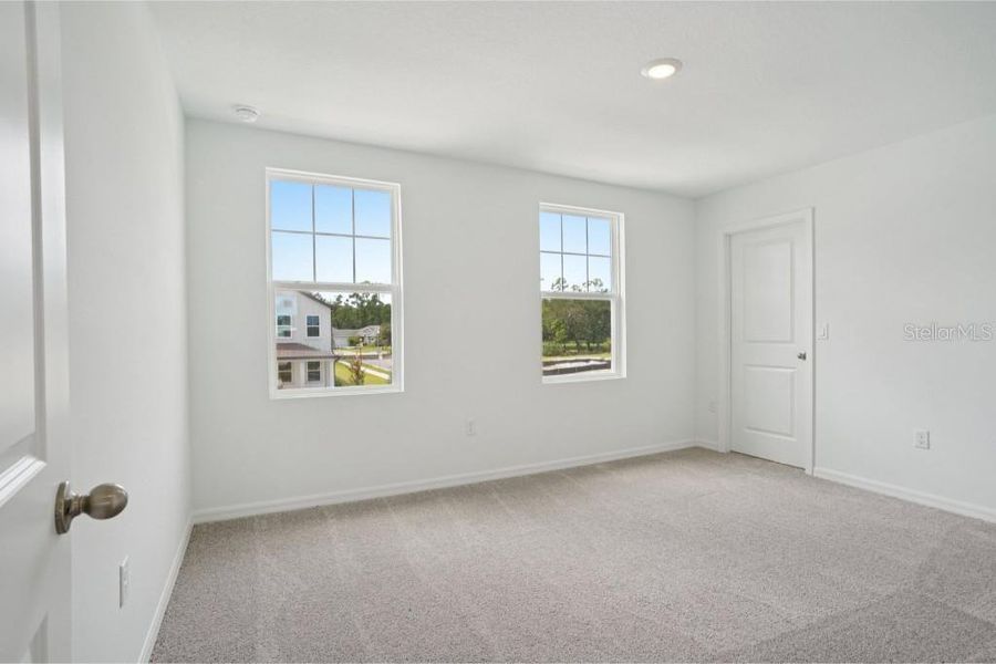 Spacious, unfurnished interior of a new home in Ardisia Park Traditional, New Smyrna Beach (Image 27).