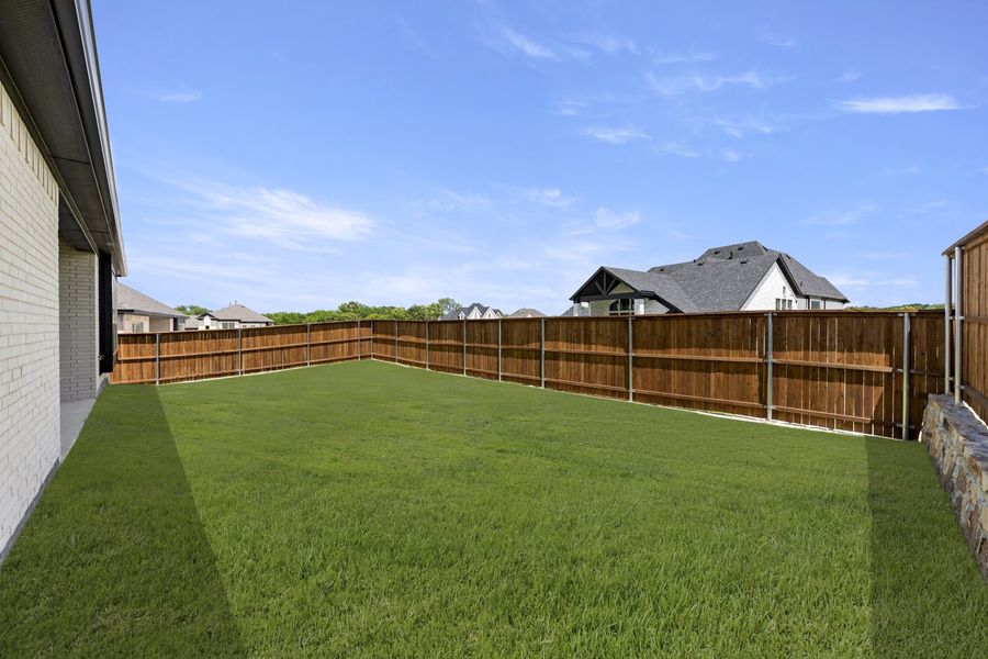 Exterior details and patio area of a home in Providence Cove, McKinney (Image 20).