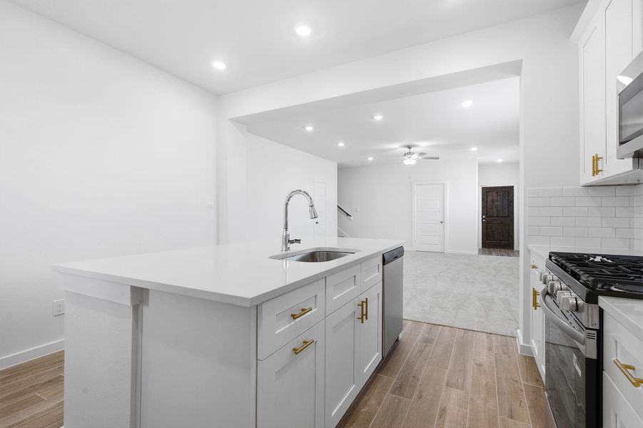 Furnished interior view inside a new home in , Iowa Colony (Image 32).