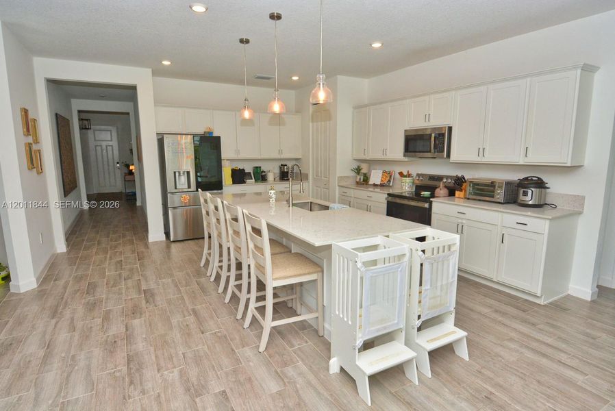 Furnished interior view inside a new home in Central Park, Port St. Lucie (Image 38).