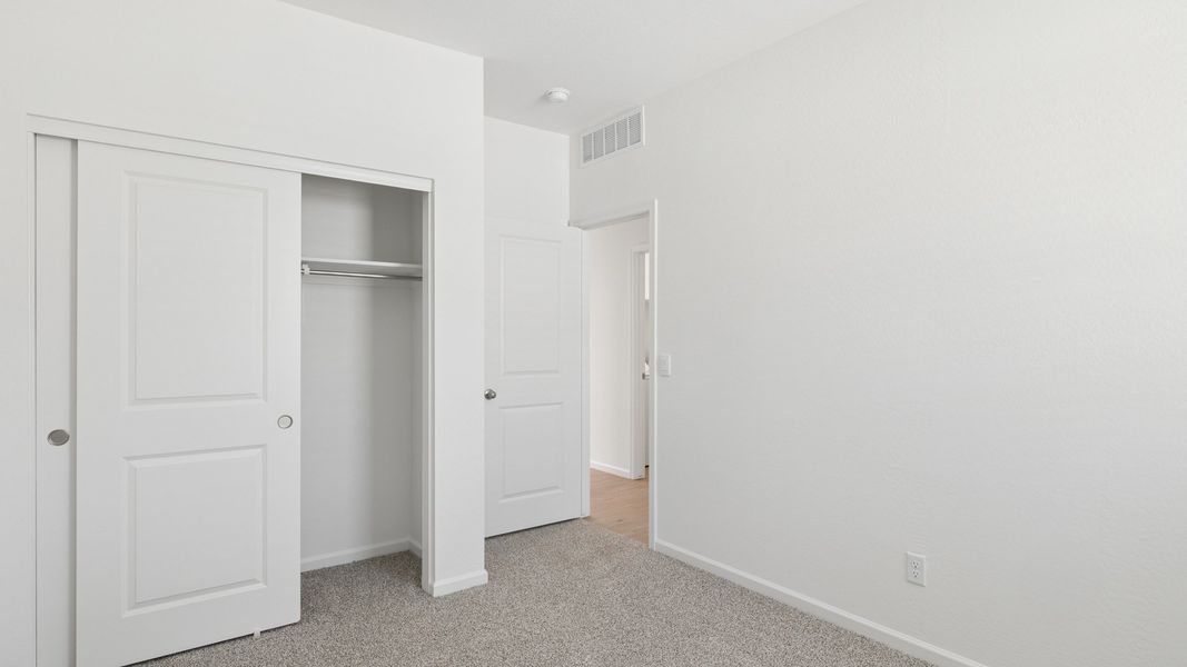 Spacious, unfurnished interior of a new home in Copper Falls, Buckeye (Image 18).