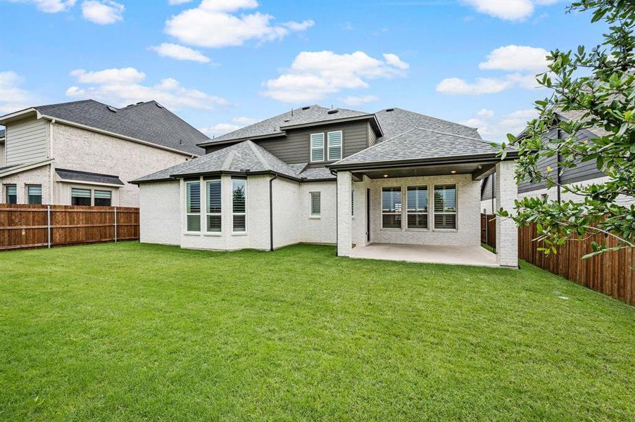 Exterior details and patio area of a home in Wildflower Ranch, Fort Worth (Image 4).