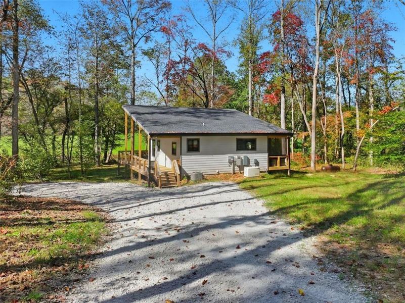 Exterior details and patio area of a home in , Ellijay (Image 18).