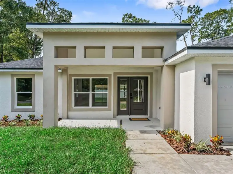 Exterior details and patio area of a home in , Ocala (Image 28).