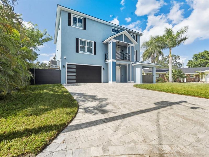 Front exterior of a new home in , Tampa, FL, highlighting curb appeal (Image 28). Front exterior of a new home in , Tampa, FL, highlighting curb appeal (Image 28).