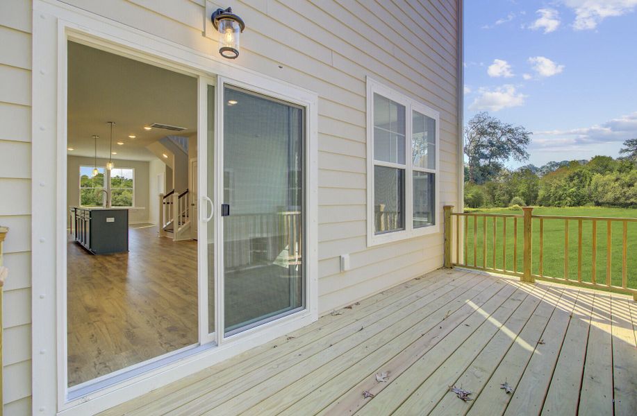 Exterior details and patio area of a home in Indigo Grove Townhomes, Johns Island (Image 20).