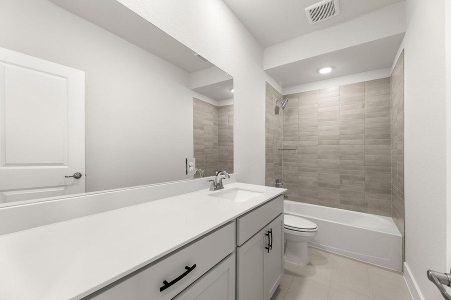 Furnished interior view inside a new home in Union Park, Little Elm (Image 7).