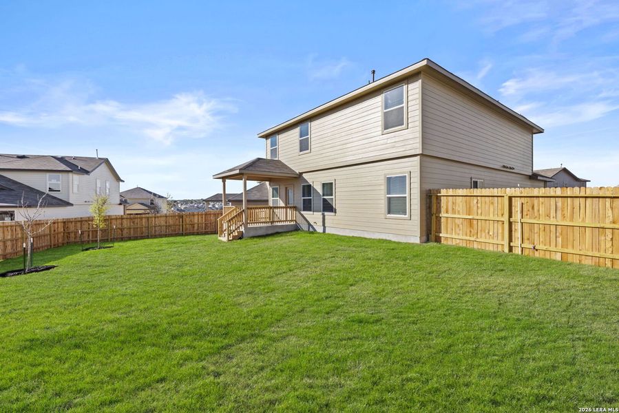 Exterior details and patio area of a home in Redbird Ranch, San Antonio (Image 3).